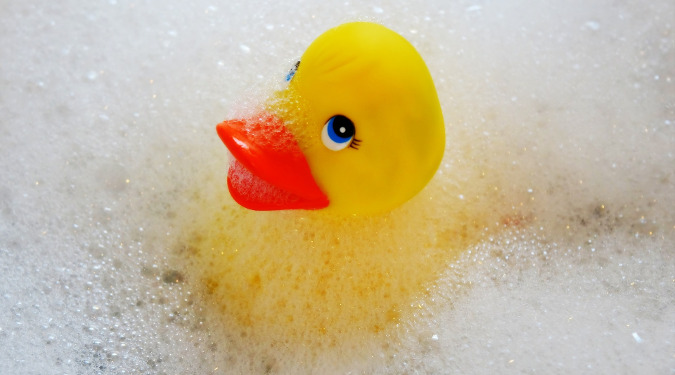 Rubber Duckie Taking a bubble bath.